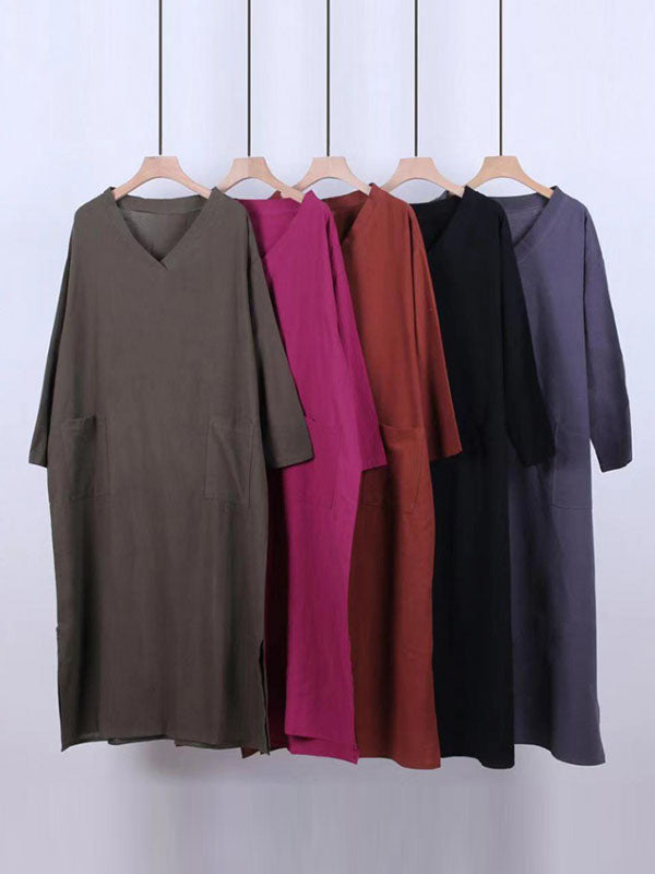 Robe longue fendue sur le côté coupe trapèze, à manches longues, à poches, à col en V, couleur unie