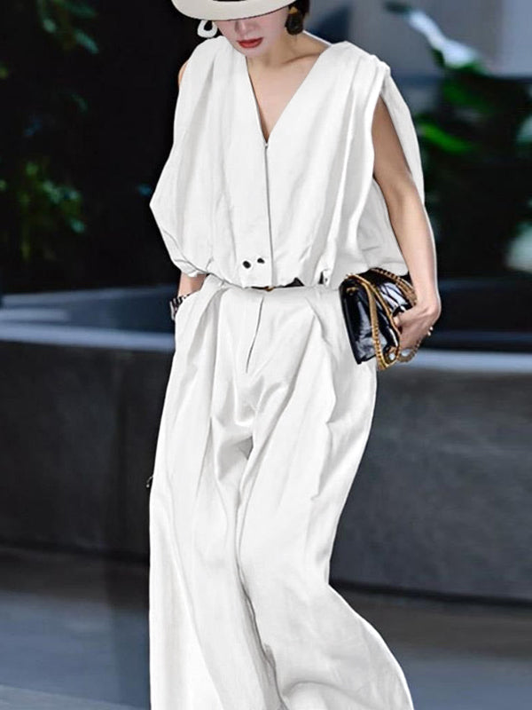 Pantalon de tailleur ample plissé taille haute, à empiècements, couleur unie