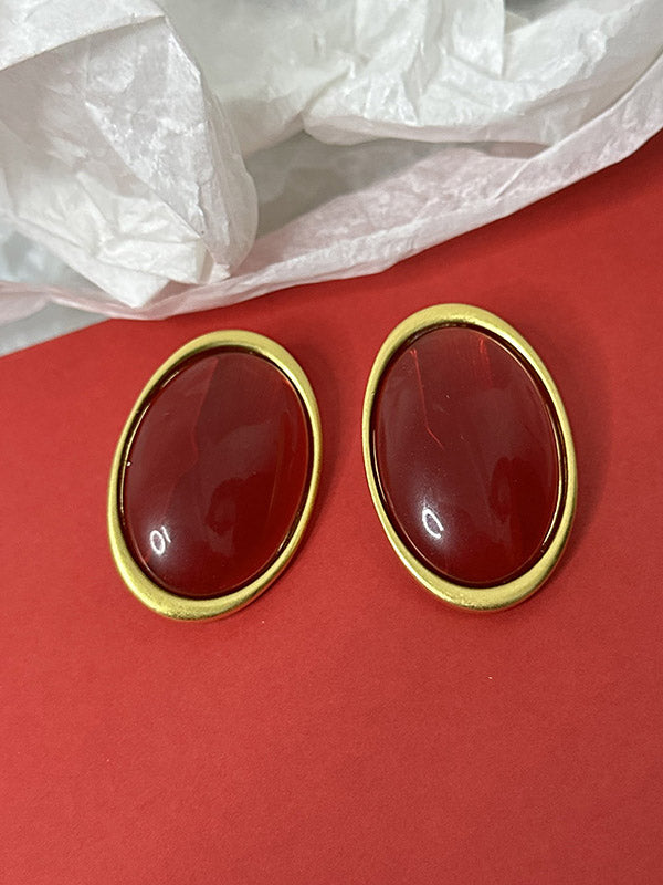 Boucles d'oreilles géométriques à empiècements