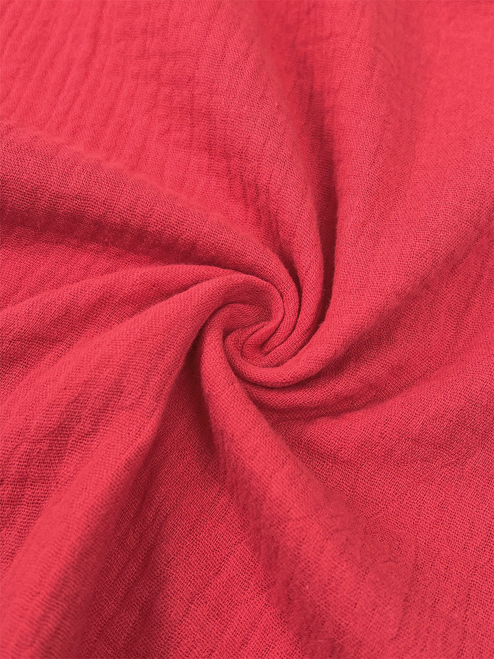 Chemisier ample boutonné à manches longues, à col revers, couleur unie