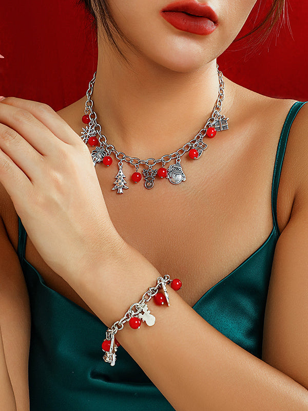 Collier géométrique à pompons