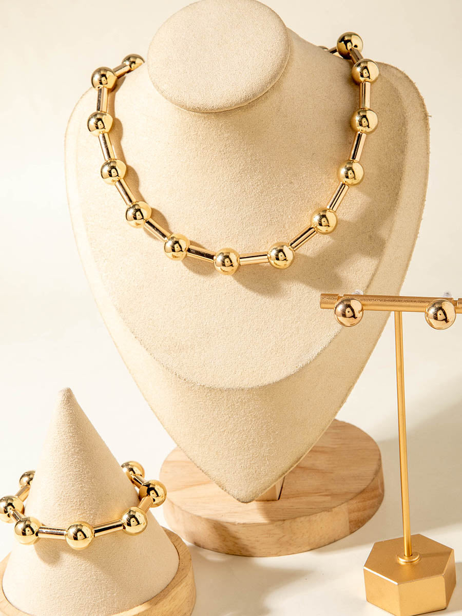 Parure collier et boucles d'oreilles géométrique couleur unie