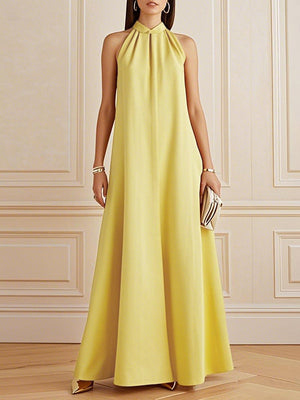 Robe longue ample plissée coupe trapèze, à col cheminée, couleur unie