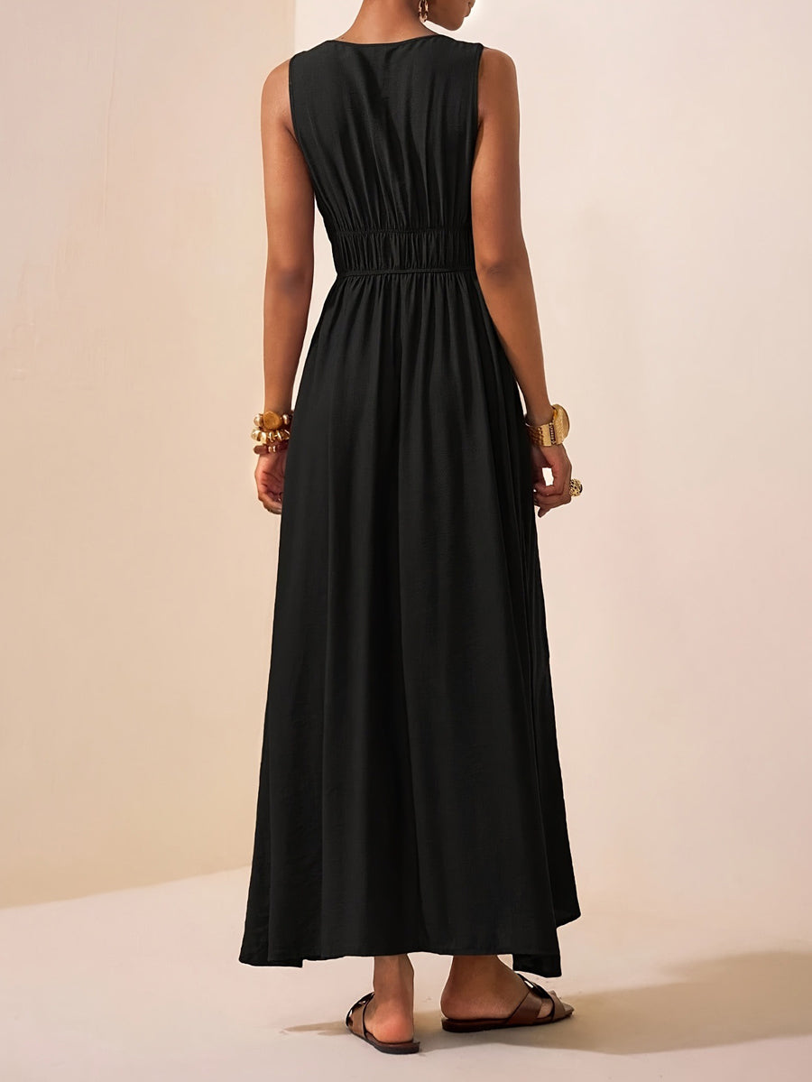 Robe longue ample plissée coupe trapèze, à fines bretelles, couleur unie