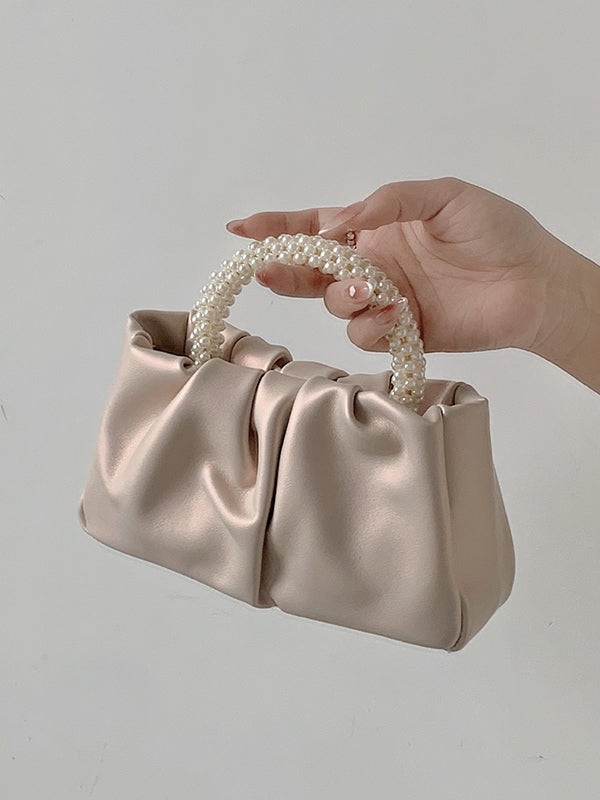 Sac à main perlé à empiècements