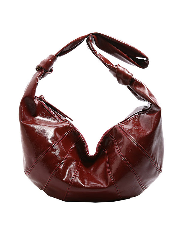Sac bandoulière géométrique à empiècements, à fermeture éclair