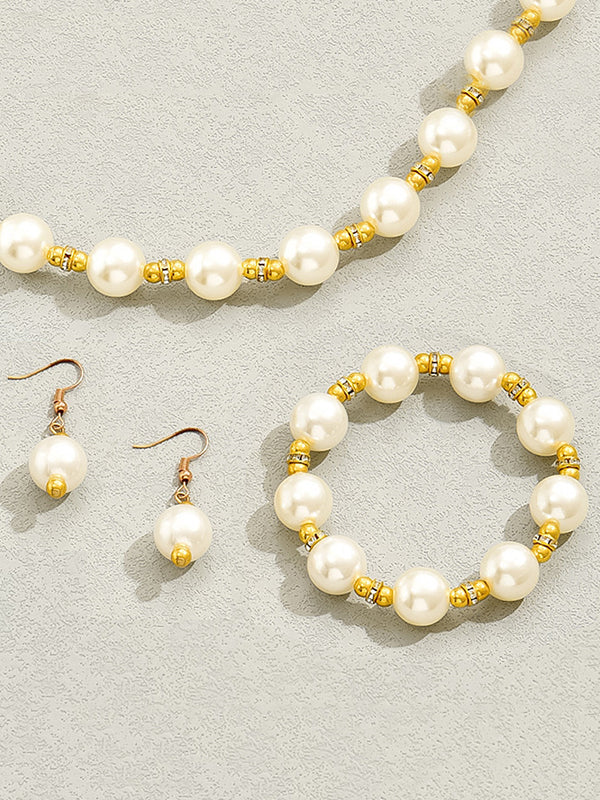 Parure bracelet, boucles d'oreilles pendantes et collier géométrique