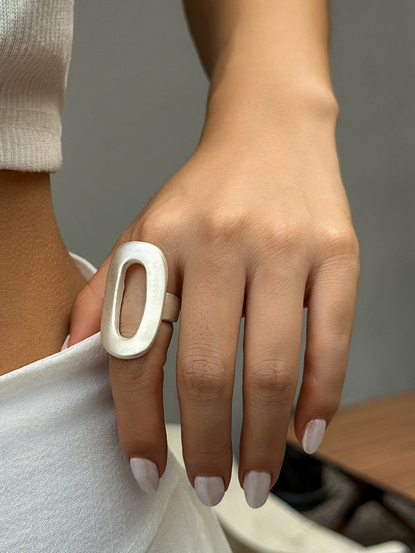 Bague réglable géométrique ajourée couleur unie