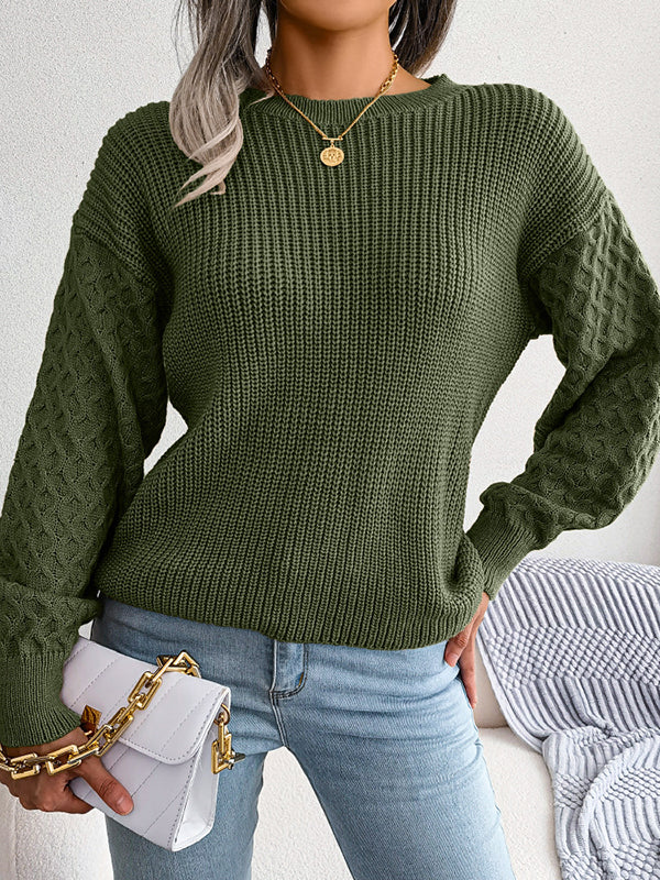 Pull ample à manches longues en tricot torsadé de couleur unie à col rond