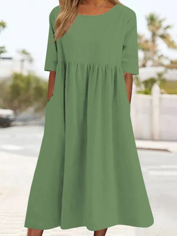 Robe mi-longue plissée coupe trapèze, à manches mi-longues, à poches, à col rond, couleur unie