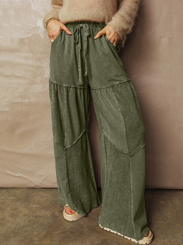 Pantalon ample plissé taille haute, à cordon de serrage, à poches, à empiècements, couleur unie