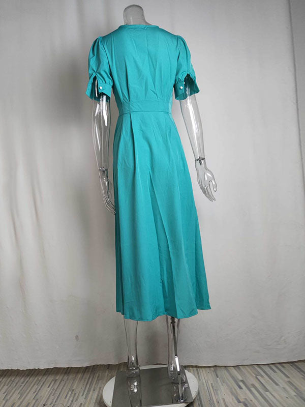 Robe mi-longue ample boutonnée taille haute, à col rond