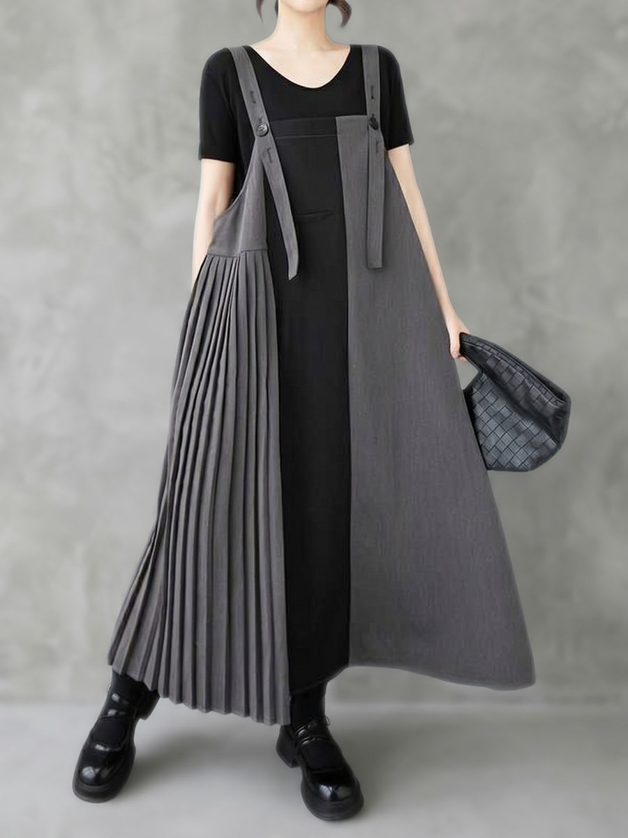 Robe mi-longue ample asymétrique boutonnée plissée coupe trapèze, à poches, à empiècements, à bretelles réglables, couleur contrastée