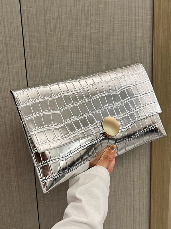Sac à main géométrique brillant à empiècements