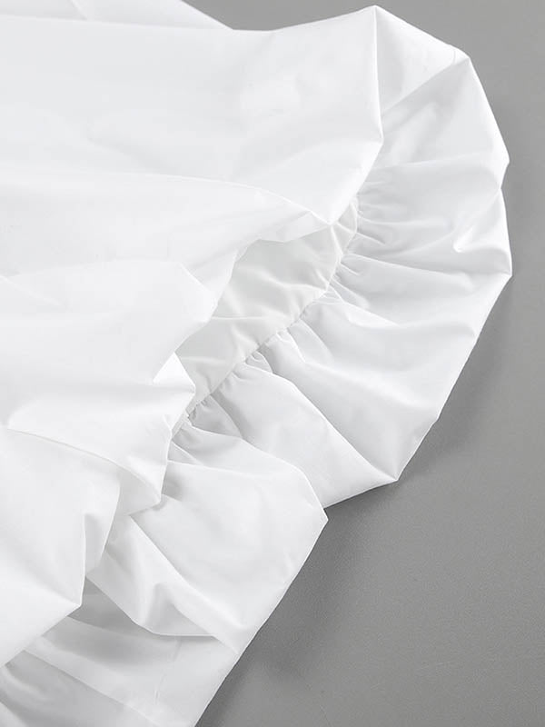 Robe mi-longue ample plissée sans manches, à empiècements, à fines bretelles, couleur unie