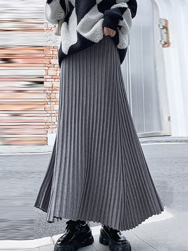 Jupe plissée coupe trapèze, taille haute, couleur unie