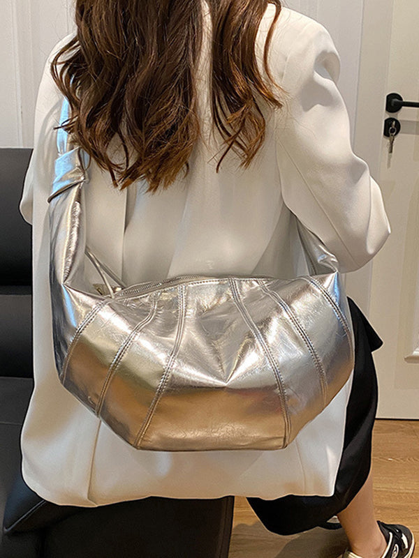 Sac bandoulière géométrique à empiècements, à fermeture éclair