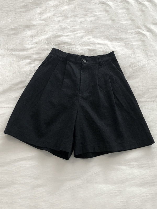 Short ample plissé à jambes larges, à taille élastique, couleur unie