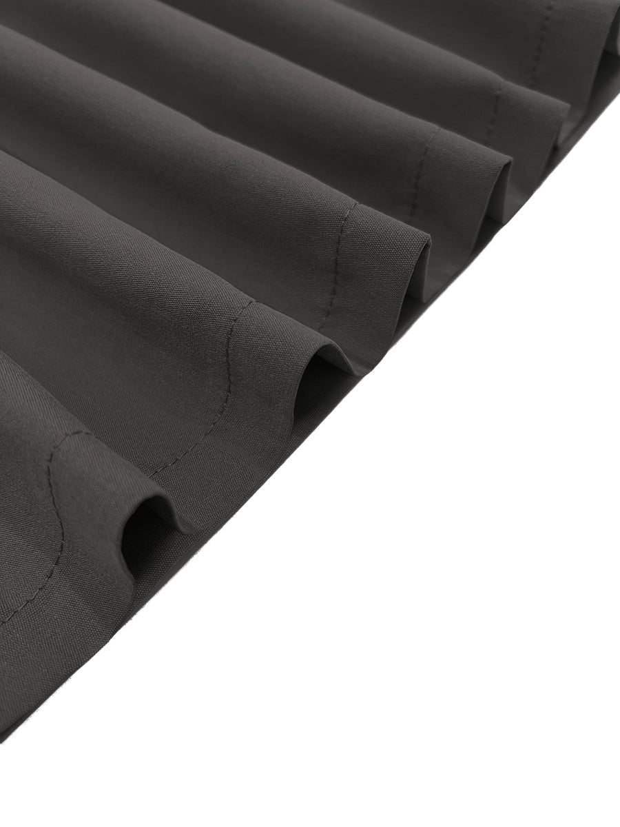 Pantalon ample plissé taille haute, à empiècements, couleur unie