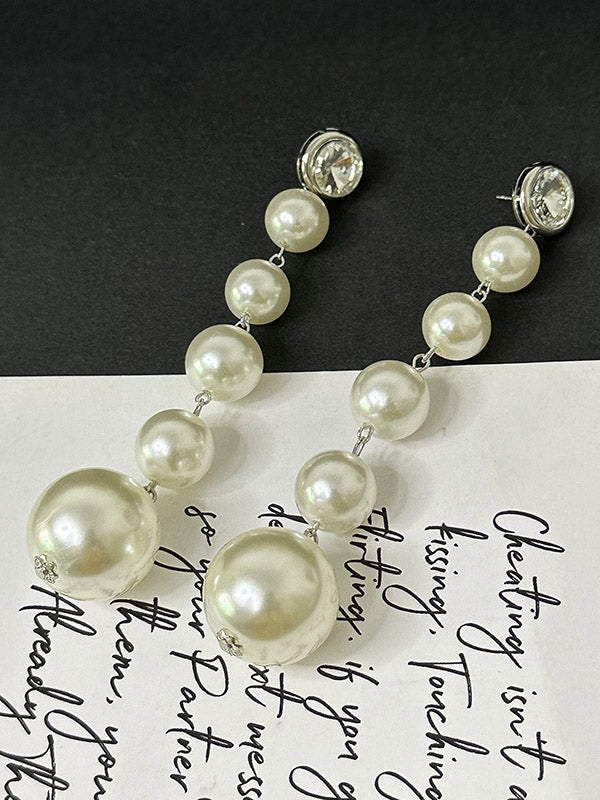 Boucles d'oreilles perlées géométriques brillantes