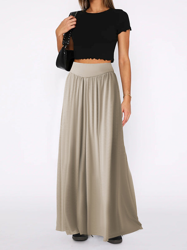 Pantalon ample plissé taille haute, à poches, à empiècements, couleur unie