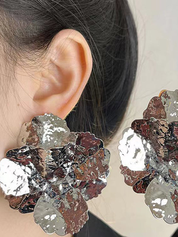 Boucles d'oreilles brillantes en forme de fleur