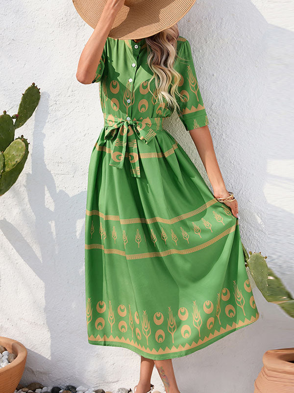 Robe mi-longue boutonnée coupe trapèze, à manches mi-longues, à taille nouée, à col revers
