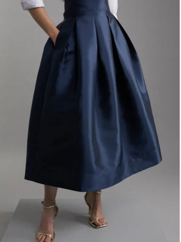 Jupe plissée coupe trapèze, taille haute, à fermeture éclair, couleur unie