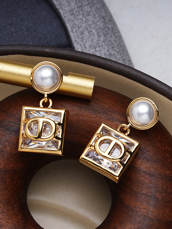 Boucles d'oreilles géométriques couleur contrastée
