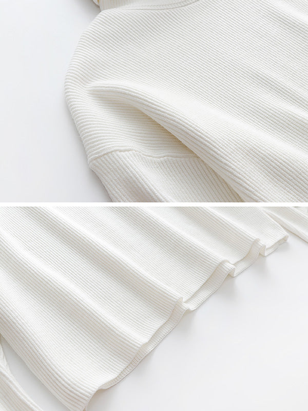 Tricot décontracté ample de couleur unie à col haut et manches longues