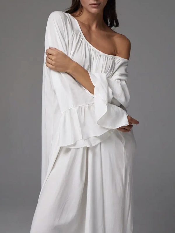 Robe longue ample plissée à manches évasées, à empiècements, à col rond, couleur unie