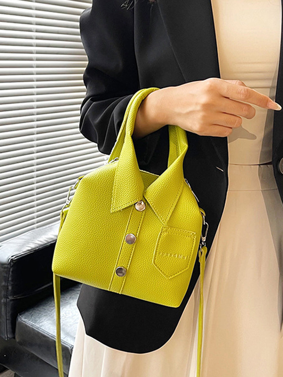 Sac à main bandoulière géométrique boutonné couleur unie