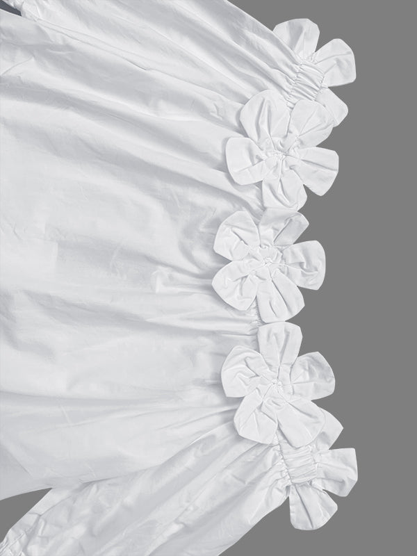 Blouse ample à épaules dénudées ornée de fleurs en 3D, couleur unie