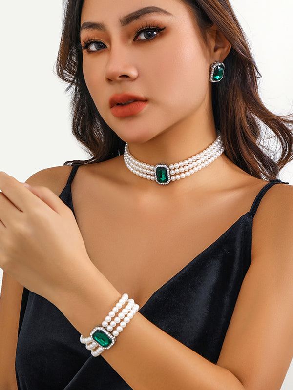 Parure bracelet, collier et boucles d'oreilles géométrique superposée à strass