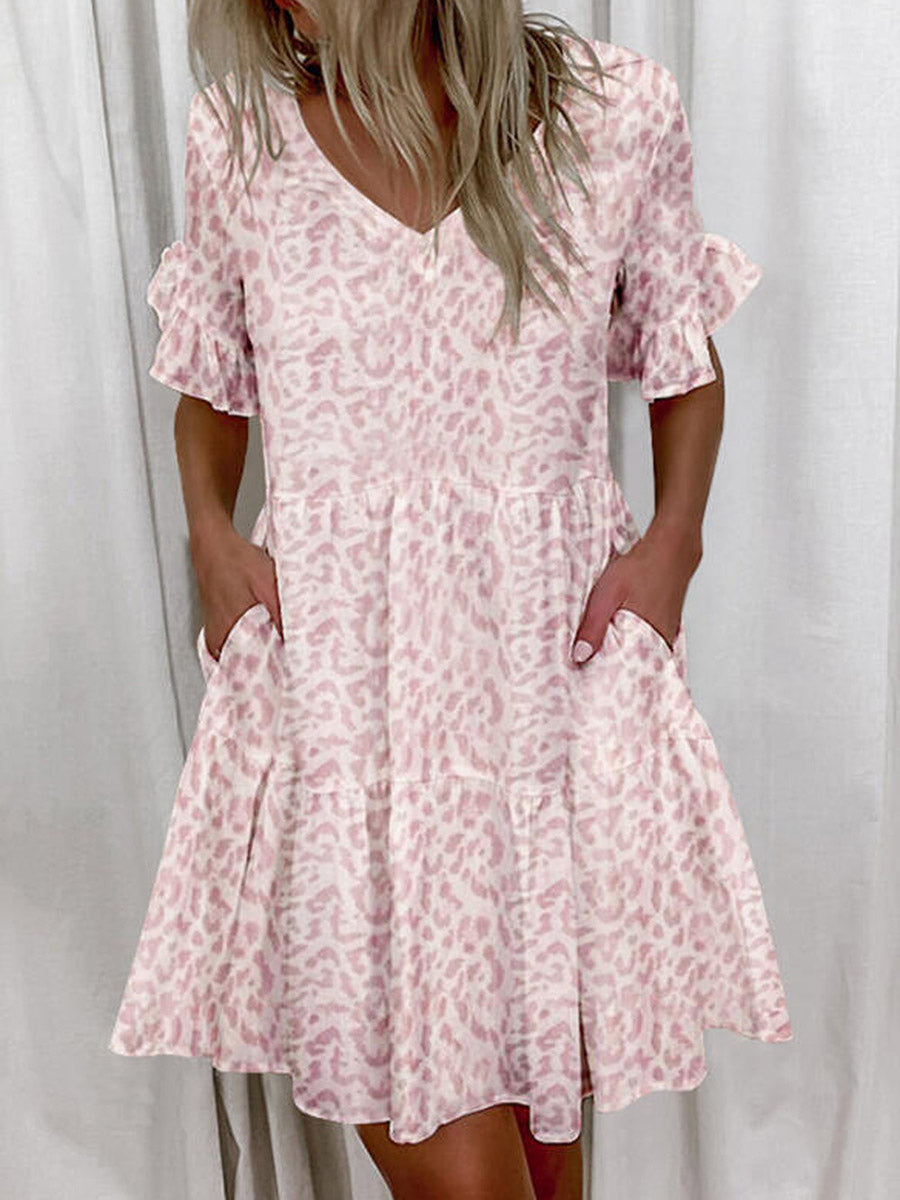 Robe mi-longue plissée imprimée coupe trapèze, taille haute, à poches, à empiècements, à col en V, couleur contrastée