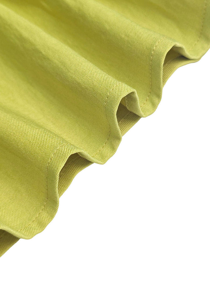 Robe courte plissée coupe trapèze, sans manches, à poches, à fermeture éclair, à col rond, couleur unie