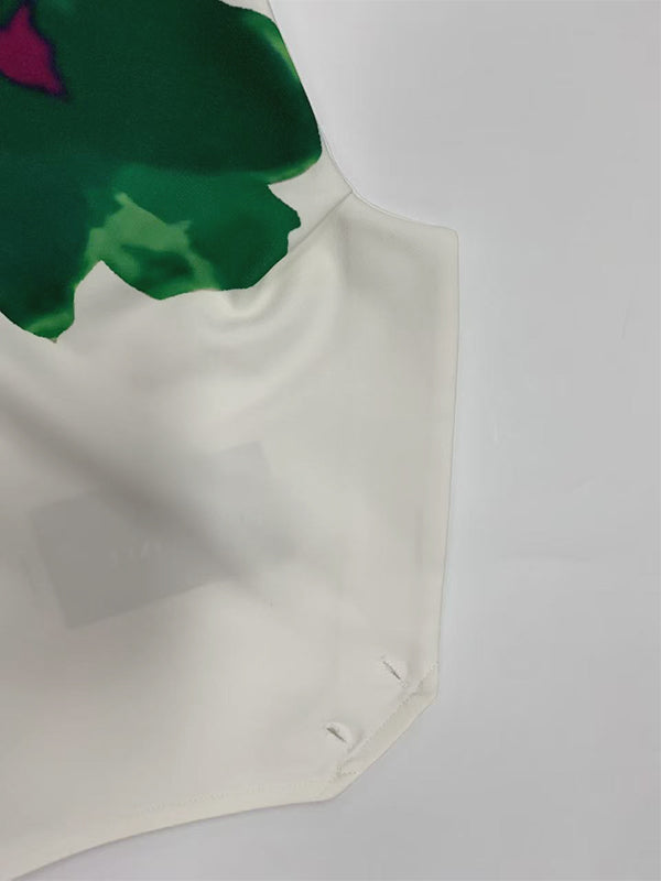 Débardeur ample asymétrique sans manches, à imprimé floral, à col cheminée