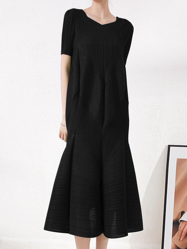 Robe mi-longue ample plissée taille haute, à col rond, couleur unie