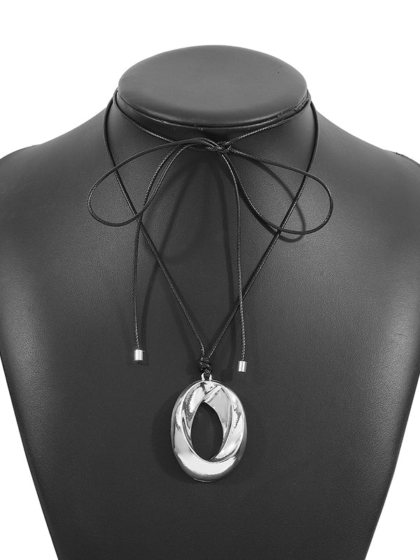 Collier réglable géométrique ajouré couleur unie