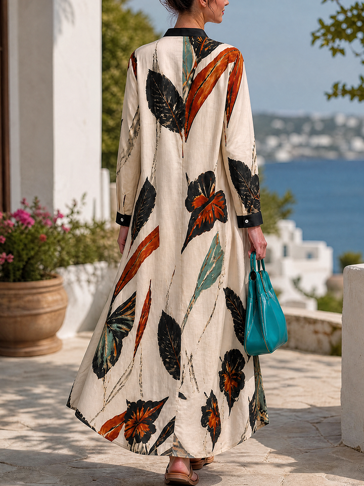 Robe chemise longue boutonnée ample à poches, à imprimé feuilles, à manches trois-quarts, à col cheminée