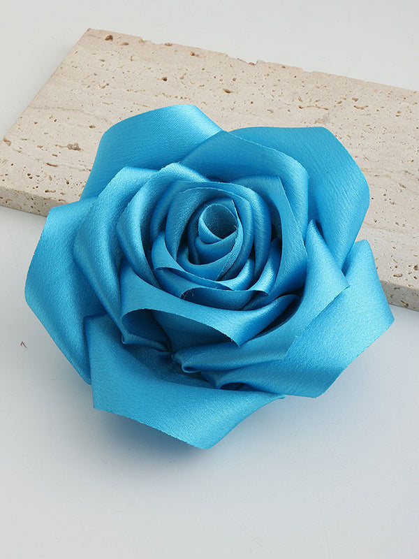 Broche en forme de fleur, couleur unie