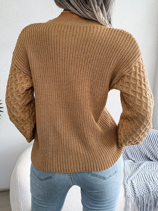 Pull ample à manches longues en tricot torsadé de couleur unie à col rond