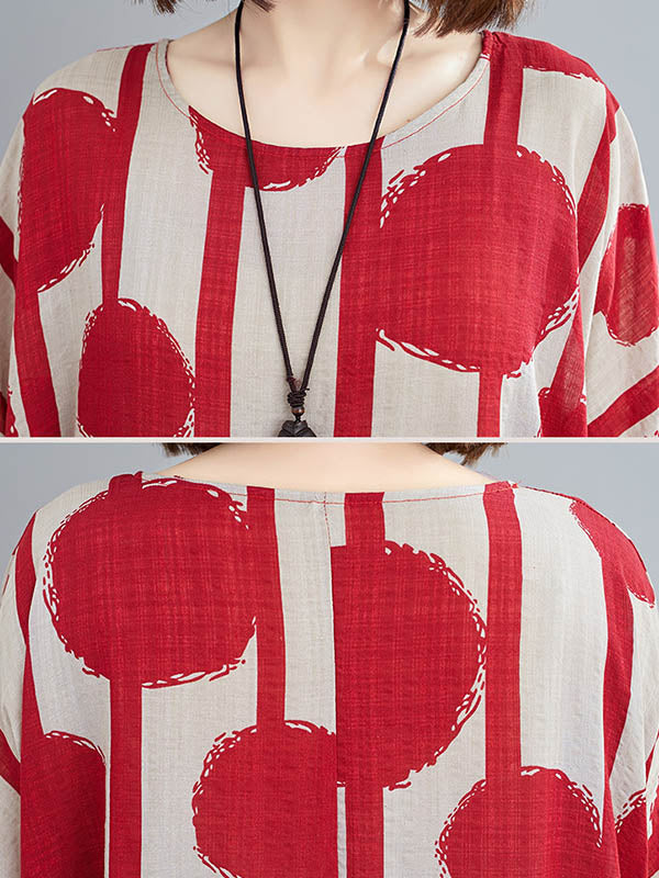 Robe mi-longue à pois, à empiècements, à col rond