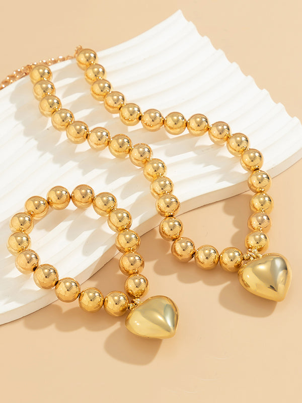 Parure bracelet et collier perlée brillante délicate en forme de cœur