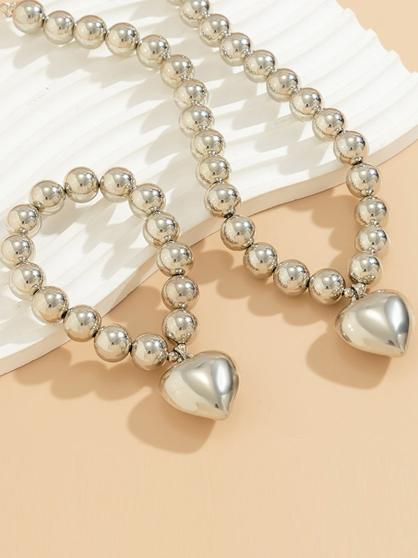 Parure bracelet et collier perlée brillante délicate en forme de cœur
