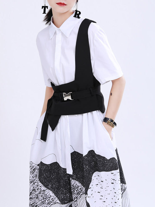 Gilet noir avec boucle de ceinture élégante