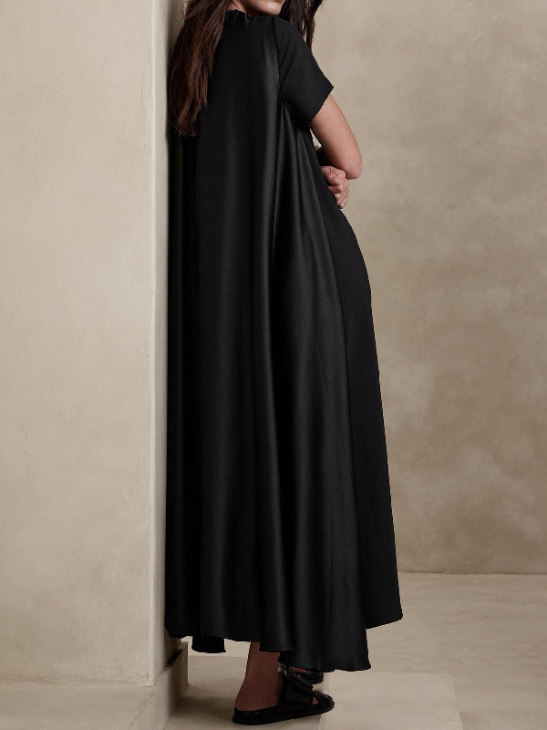 Robe longue ample à manches courtes, à poches, à col rond, couleur unie