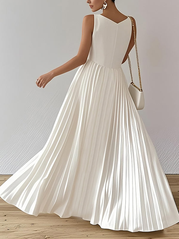 Robe longue ample plissée coupe trapèze, à col en V, couleur unie