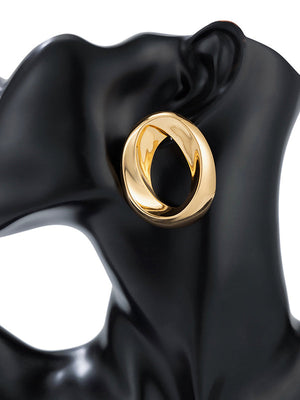 Boucles d'oreilles asymétriques brillantes couleur unie