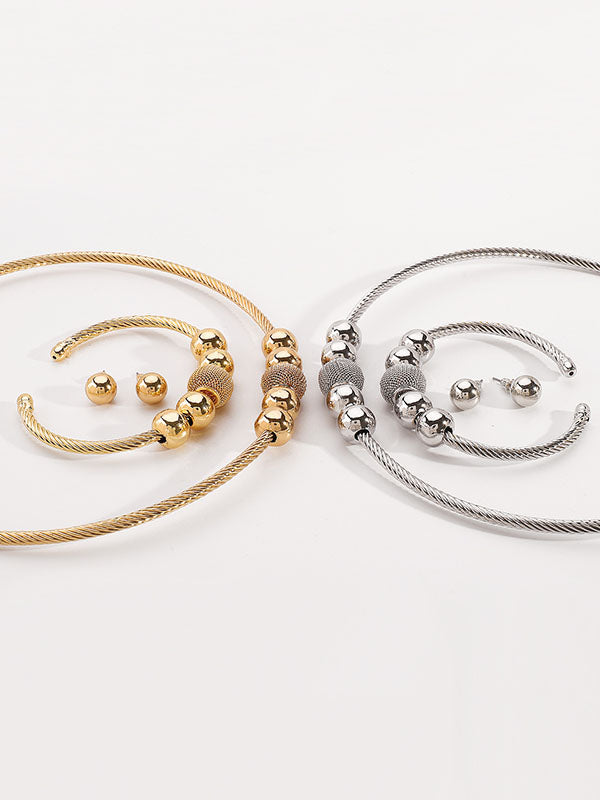 Ensemble trois pièces géométrique – collier + bracelet + boucles d'oreilles